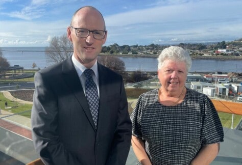 A man on the left and a woman on the right standing next to each other on the paranaple centre balcony. The waterfront park construction site is featured in the background. The man is the general manager of the Devonport City Council Matthew Atkins and the woman is the Mayor of Devonport Annette Rockliff. The photo is to promote the 2022/23 budget.